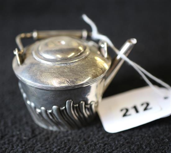 Silver model of a teapot